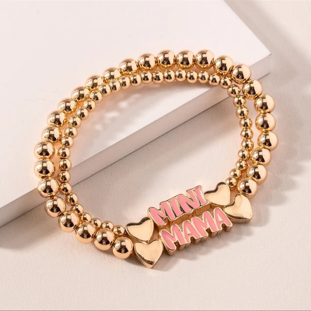 MAMA and MINI text pink and gold charm bracelet set.